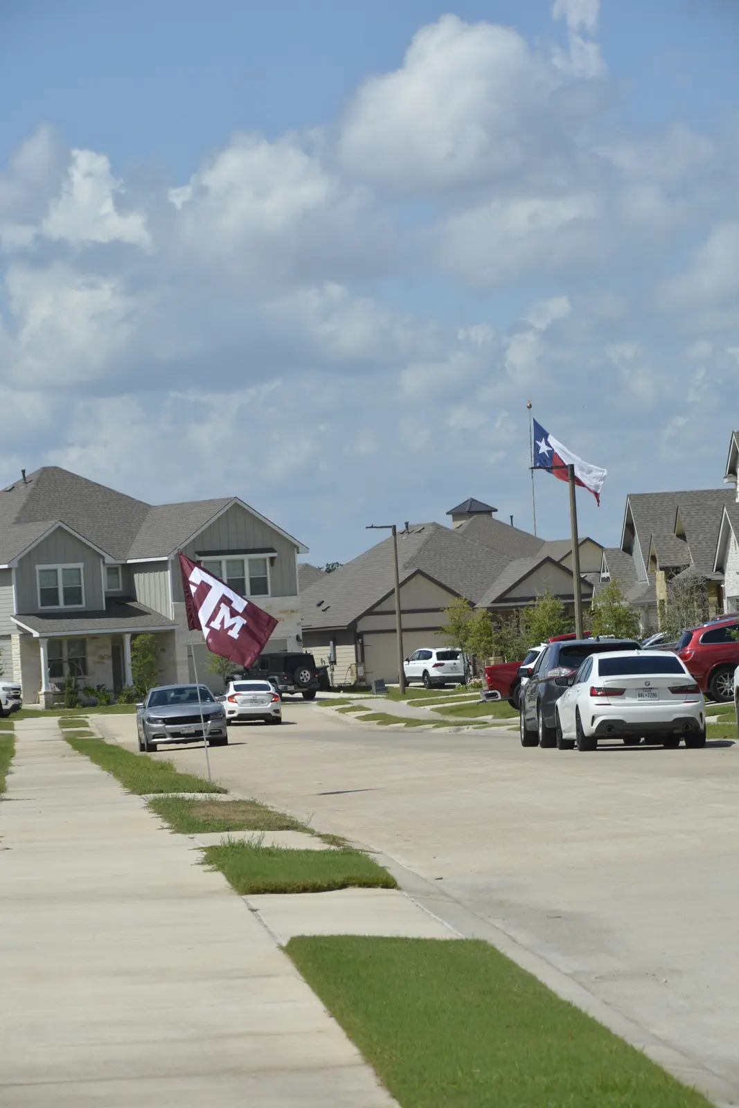 Newer College Station neighborhood displaying Texas and Texas A&M flags
